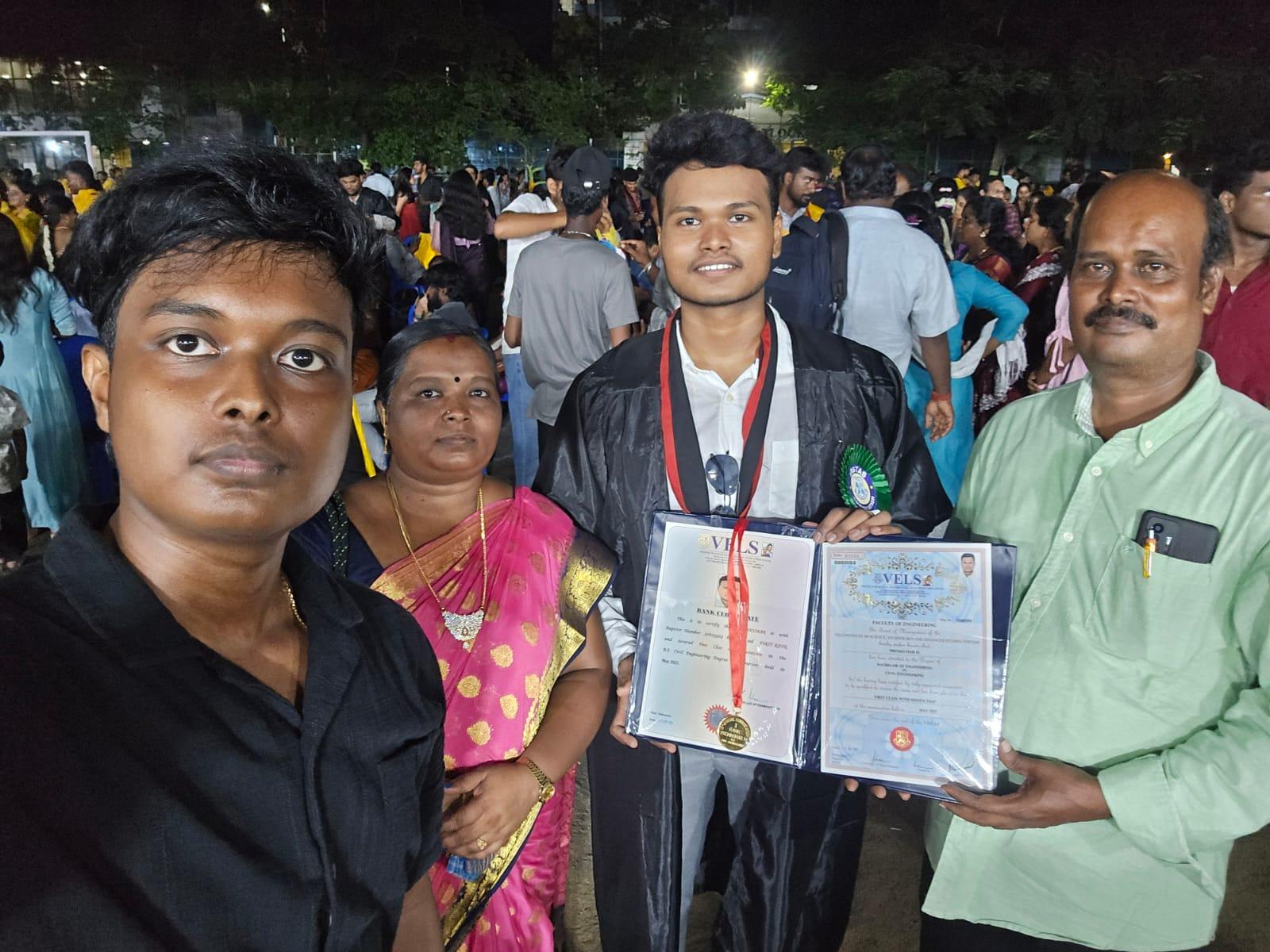 Premkumar Manivel holding his rank certificate with his family at the convocation